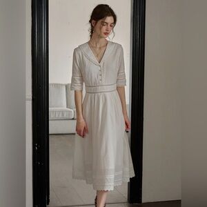 Elegant White Midi Dress